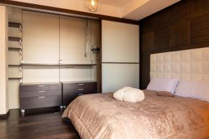 Letto o letti in una camera di Nettuno's Suite
