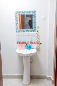 Ein Badezimmer in der Unterkunft Pearl's Place