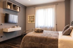 Letto o letti in una camera di Nettuno's Suite