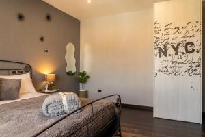 Letto o letti in una camera di Nettuno's Suite