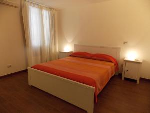 Ein Bett oder Betten in einem Zimmer der Unterkunft Home Al Rifugio