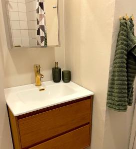 a bathroom with a sink and a mirror at Michael's in Copenhagen +19 photos