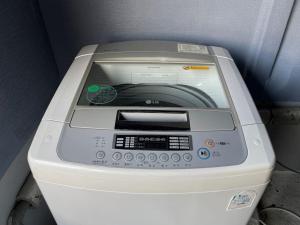 a fax machine sitting in the seat of a car at Milkyway Stay in Seoul