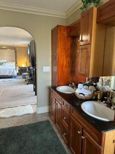 A bathroom at Royal highland livingroom bedroom suite