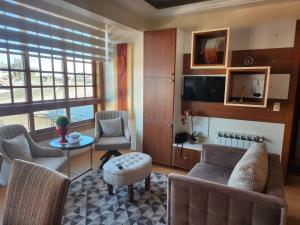 Ruang duduk di Apartamento Solar do Centro - Luxo