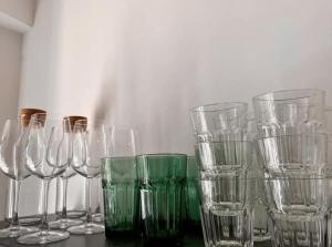 a group of wine glasses sitting on a table at Maison - Les Traversières in Eymet