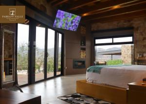 Parra del Valle Hotel Boutique客房内的一张或多张床位