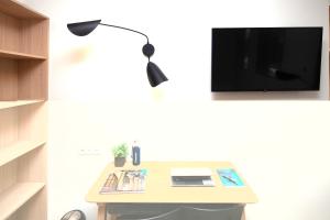 TV a/nebo společenská místnost v ubytování FINESTATE Coliving Mairie d'Issy