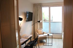 TV a/nebo společenská místnost v ubytování FINESTATE Coliving Mairie d'Issy