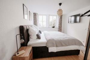 Postel nebo postele na pokoji v ubytování Altstadt Apartment Lemgo