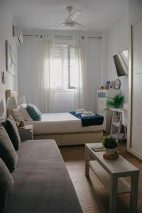 Posteľ alebo postele v izbe v ubytovaní Picasso Premium Apartment