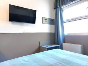 TV/trung tâm giải trí tại Hotel Vitruvio
