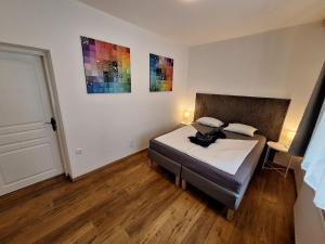 Posteľ alebo postele v izbe v ubytovaní Flataid Gästehaus Graschi - Steinbergstraße