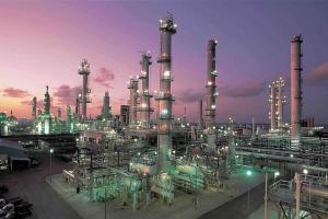a large refinery at night with a purple sky at Workforce Ready 2 bedroom in Corpus Christi