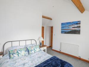 Ένα ή περισσότερα κρεβάτια σε δωμάτιο στο Bron Gadair