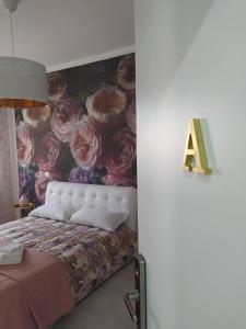 Postel nebo postele na pokoji v ubytování B&B Potenza IT