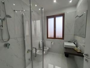 Koupelna v ubytování B&B Potenza IT + 9 fotografií