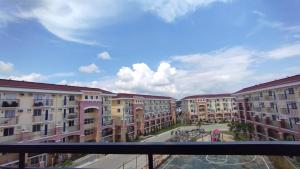 a view from a balcony of an apartment complex at My Arezzo 1 BR Condo in Davao City