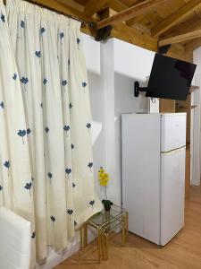 Dapur atau dapur kecil di Apartamento patio de los leones