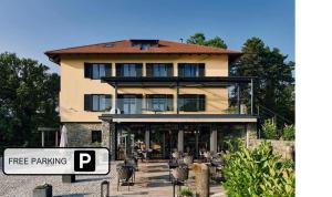 a building with a free parking sign in front of it at Hotel Republika in Zagreb
