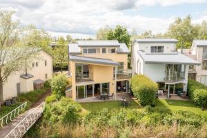 an aerial view of a house at Tawny House CW6 Lakeside Spa Property in Somerford Keynes
