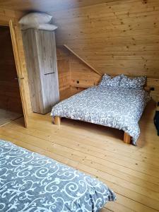 Postel nebo postele na pokoji v ubytování Vila Planinski san 2