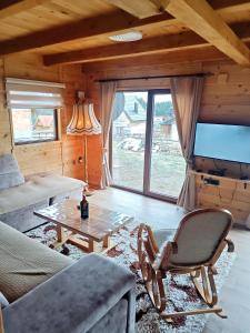 TV a/nebo společenská místnost v ubytování Vila Planinski san 2 + 18 fotografií