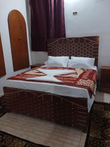 Postel nebo postele na pokoji v ubytování Luxor Villa Hatshepsut