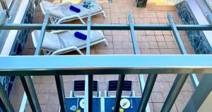 Μπαλκόνι ή βεράντα στο Spacious House with Pool Views and BBQ, Eternal Summer Serenity