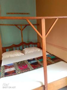 a bunk bed in a room with at Kabatoro Guest House in Kabatoro