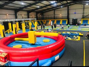 a play room with a large inflatable pool at Golden Sands 6 Berth Beach front Ingoldmells beds made up for arrival WIFI in Ingoldmells
