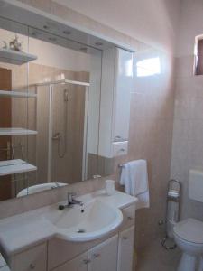 Koupelna v ubytování Apartment A&M + 18 fotografií