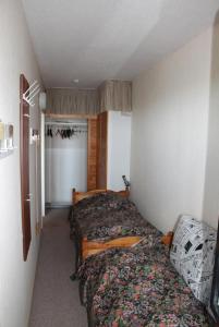 Ein Bett oder Betten in einem Zimmer der Unterkunft Ferienwohnung F324 für 2-4 Personen an der Ostsee