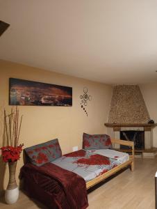 a bedroom with a bed and a fireplace at Onboarding! in Naples