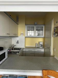 Köök või kööginurk majutusasutuses Strandhotel Wohnung 2