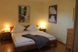 Ένα ή περισσότερα κρεβάτια σε δωμάτιο στο Jacobihof Haus 9 Wohnung 02
