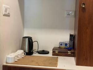 Koffie- en theefaciliteiten bij Coffee Cradle Wayanad Luxuorios Private Tree House - Inside 2 Acre Coffee Plantation