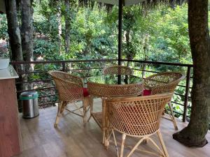 Een tuin van Coffee Cradle Wayanad Luxuorios Private Tree House - Inside 2 Acre Coffee Plantation