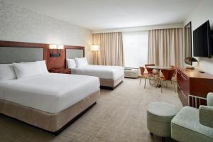 Cama ou camas em um quarto em TownePlace Suites by Marriott Orlando Downtown