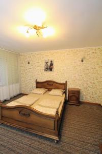 Postel nebo postele na pokoji v ubytování Затишний міні-готель "Rosky"