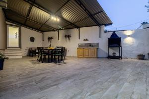 Patio nebo venkovní prostory v ubytování Holiday House Ulika