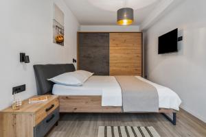 Postel nebo postele na pokoji v ubytování Villa Magdalena Kaštela
