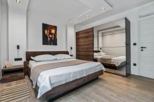 Postel nebo postele na pokoji v ubytování Villa Magdalena Kaštela