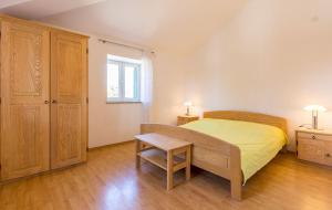 Postel nebo postele na pokoji v ubytování Ferienwohnung mit Pool, Klima, Grillplatz, Balkon