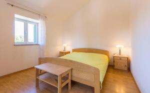Postel nebo postele na pokoji v ubytování Ferienwohnung mit Pool, Klima, Grillplatz, Balkon