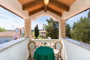 Balkón nebo terasa v ubytování Ferienwohnung mit Pool, Klima, Grillplatz, Balkon