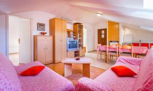 Kuchyň nebo kuchyňský kout v ubytování Appartement nur 800 Meter bis zum Sandstrand mit Klima, WLAN, Haustiere sind erlaubt
