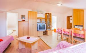 Kuchyň nebo kuchyňský kout v ubytování Appartement nur 800 Meter bis zum Sandstrand mit Klima, WLAN, Haustiere sind erlaubt