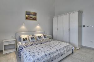 Posteľ alebo postele v izbe v ubytovaní Schöne Finca mit privatem Pool, Klima, WLAN, Terrasse, Grill