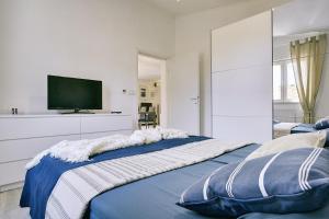 Ένα ή περισσότερα κρεβάτια σε δωμάτιο στο Traumhafte Strandfinca mit eigenem Zugang zum Strand und Klima, WLAN, BBQ